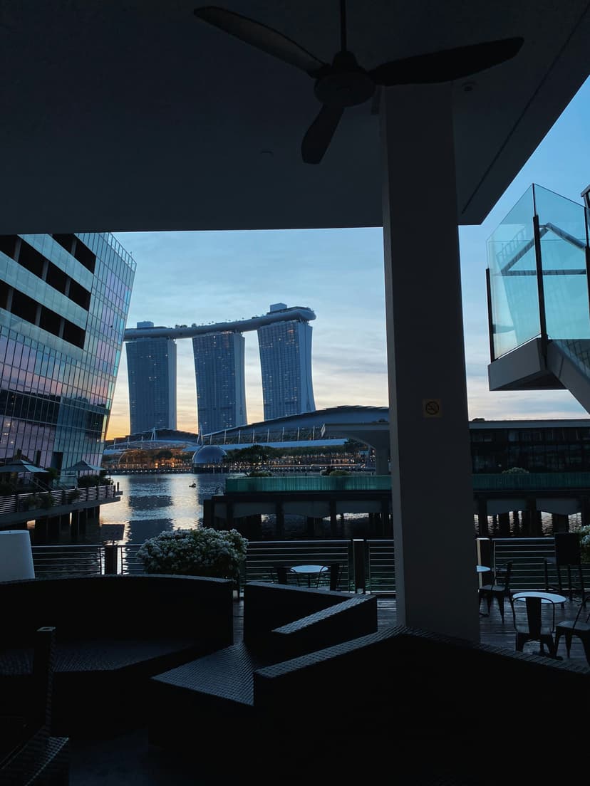 Singapore Marina Bay Sands hotel with infinity pool overlooking city skyline at twilight